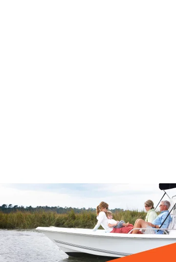 Family in their boat on the lake.