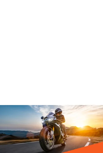 Person on his motorcycle on the road.