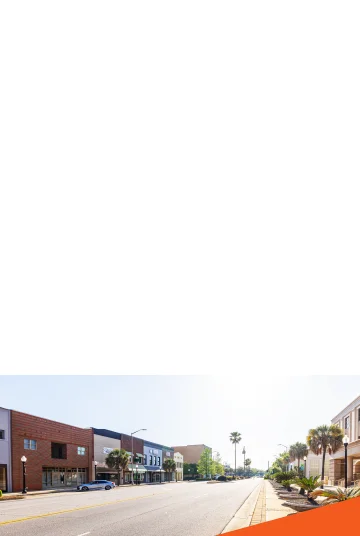 The old business district on Broad Ave, cheap car insurance in Albany, Georgia. Image2: US city Albany road sign on highway, cheap car insurance in Albany, Georgia.